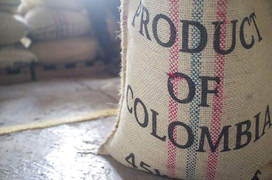 gray, pink, and blue product of Columbia-printed sack, coffee HD wallpaper