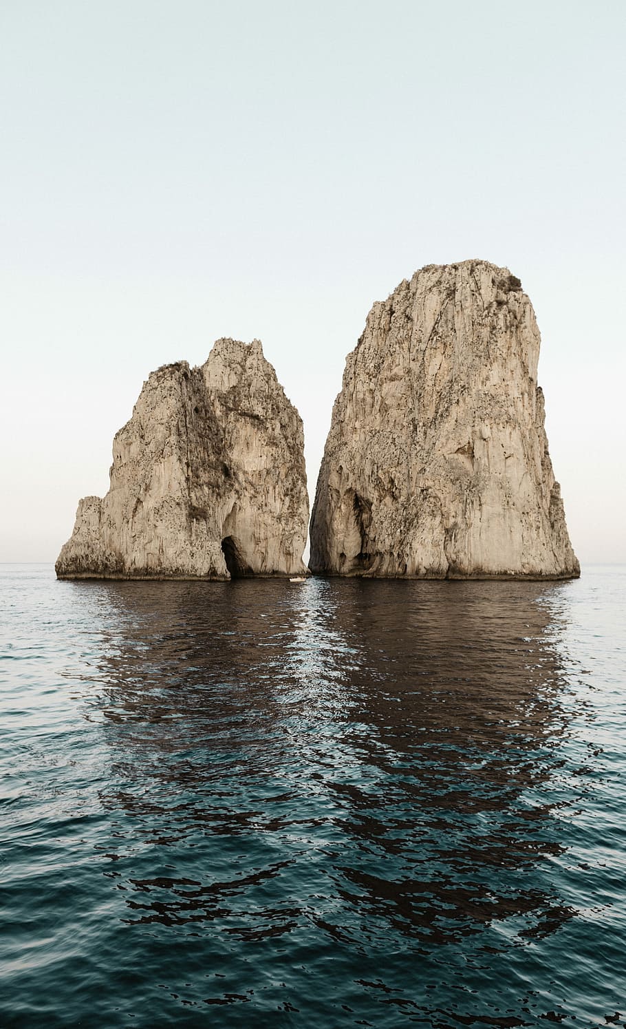 two beige rock formations on body of water, untitled, wallpaper HD wallpaper