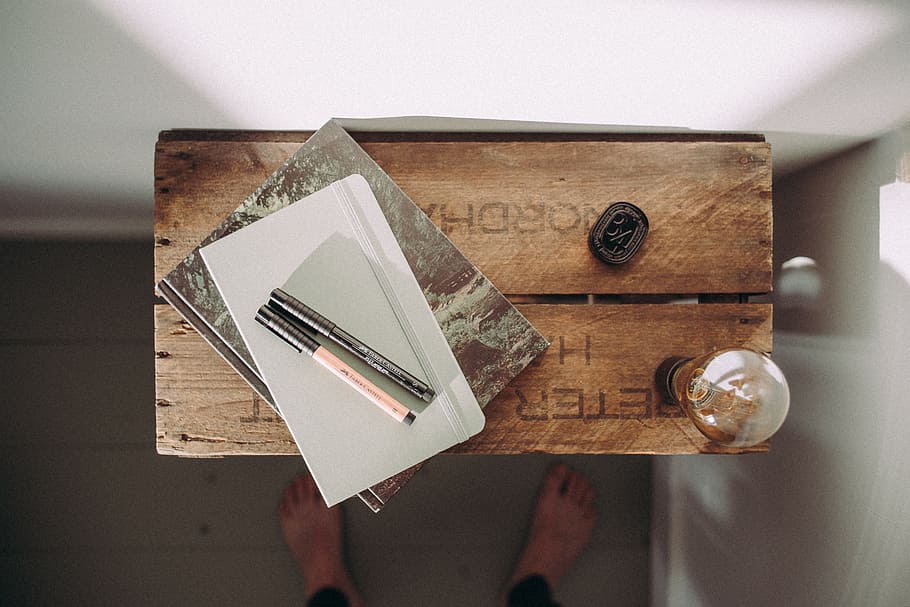 wooden, table, pen, notes, book, light, feet, wood - material HD wallpaper