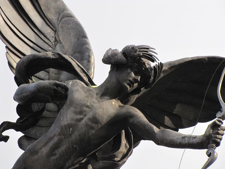 cupid statue near white surface, eros, piccadilly, london, city