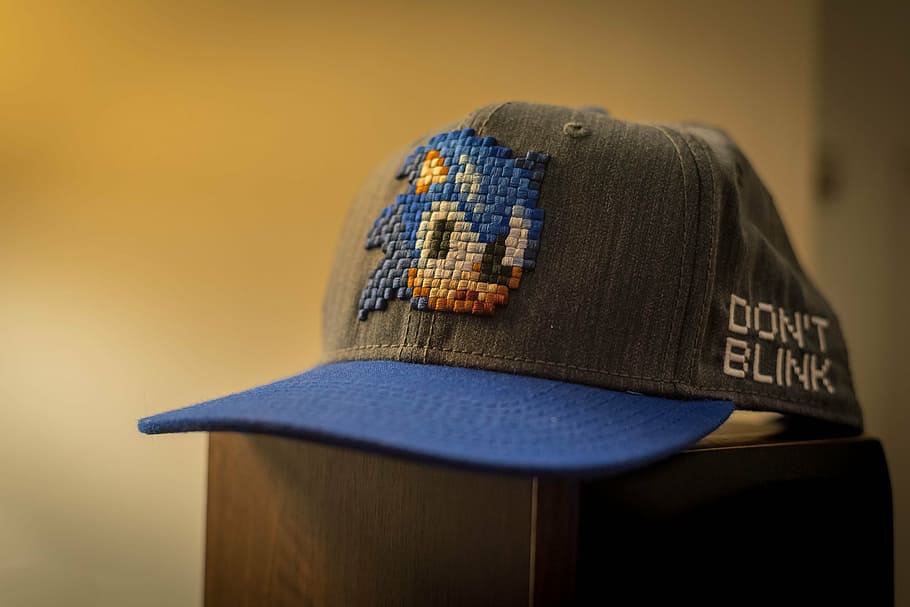 close-up photography of gray Sonic Hedgehog fitted cap, hat HD wallpaper