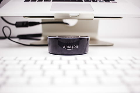 Amazon Echo Dot 2nd gen, closeup photo of Amazon Echo Dot near MacBook HD wallpaper