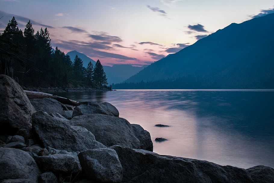 body of water during sunset, body of water near mountain, lake HD wallpaper
