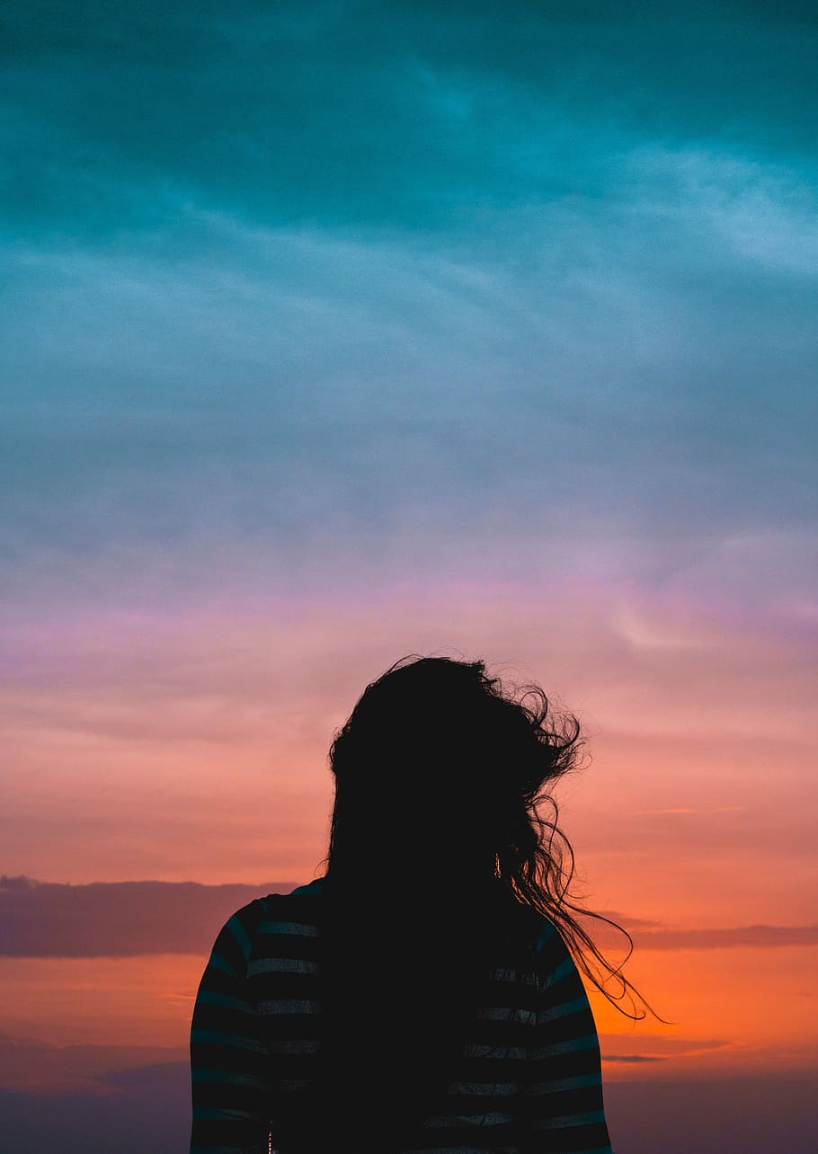 woman wearing striped standing under cloudy sky, silhouette of woman near seashore during sunset HD wallpaper