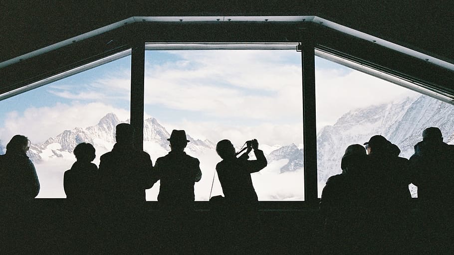 Better to stay inside?, silhouette of people in crowded room during daytime HD wallpaper