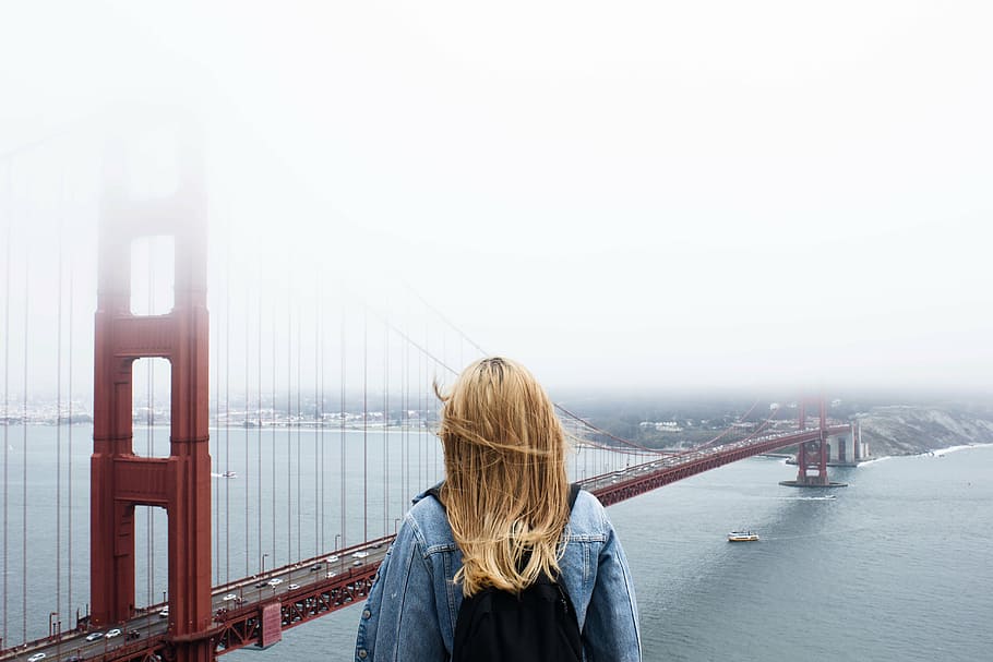 woman standing near golden gate bridge, daytime, architecture HD wallpaper