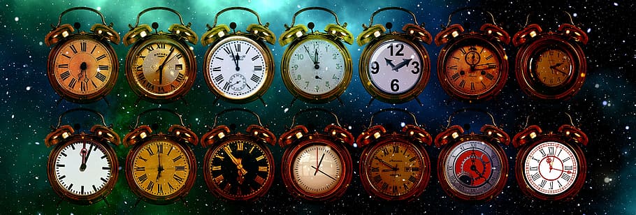 closeup photography of assorted-color analog clock lot, time