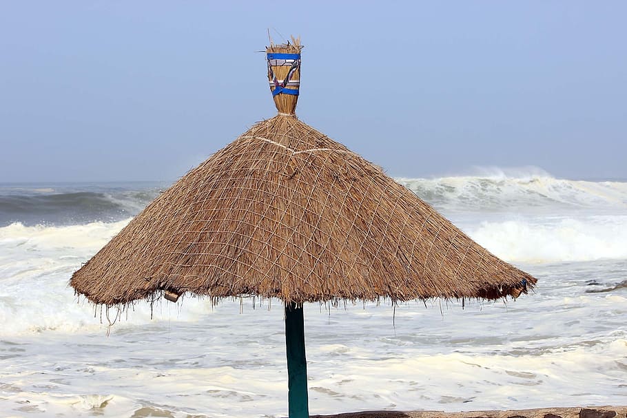 sea, beach, straw, waves, land, thatched roof, nature, sky HD wallpaper