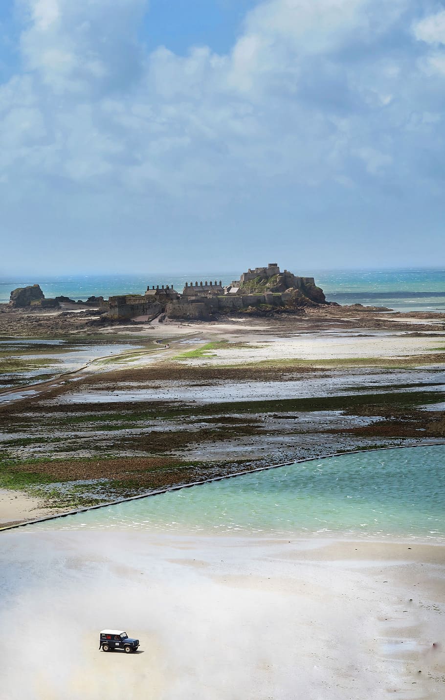 castle near body of water, aerial view of vehicle park near castle by the beach HD wallpaper
