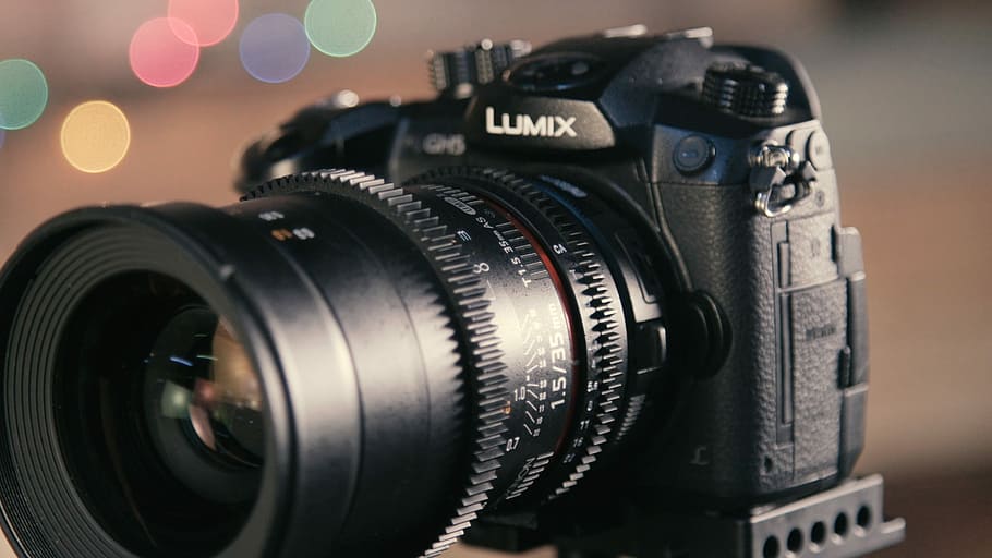 shallow focus photography of black Lumix DSLR camera, black Lumix DSLR camera HD wallpaper