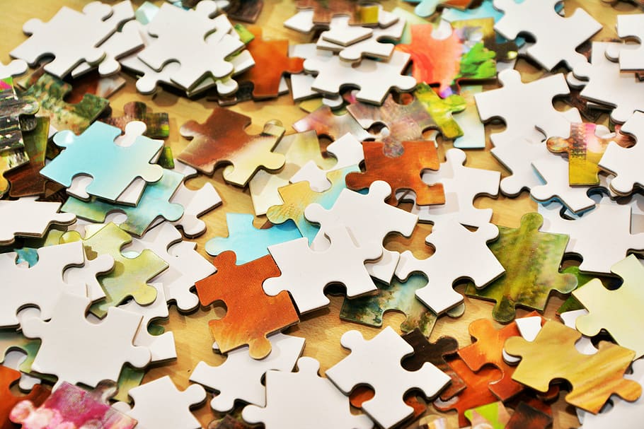 close-up photo of jigsaw puzzle pieces, pieces of the puzzle