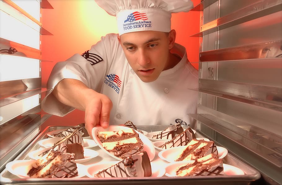 man placing cake inside cooler, pies, chef, food, dessert, servings