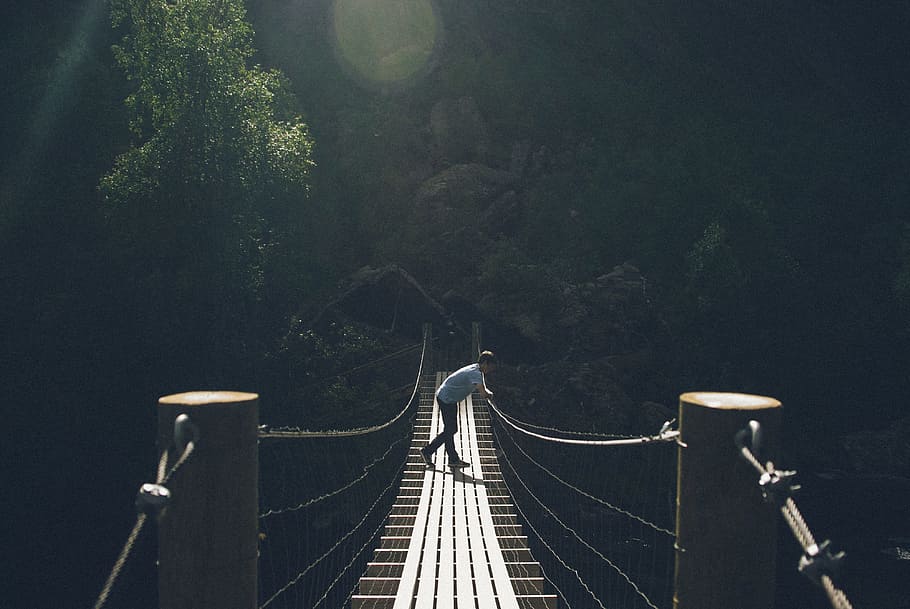 Guy on suspension bridge, nature, people, bridge - Man Made Structure HD wallpaper