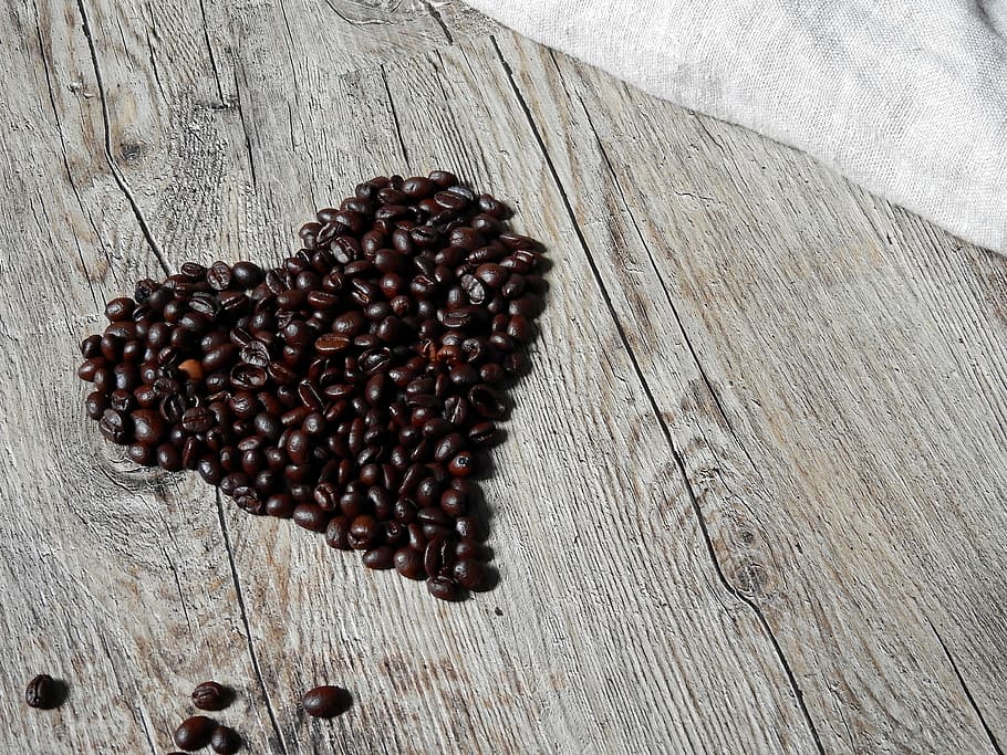 coffee beans formed into heart on gray surface, caffeine, roasted HD wallpaper