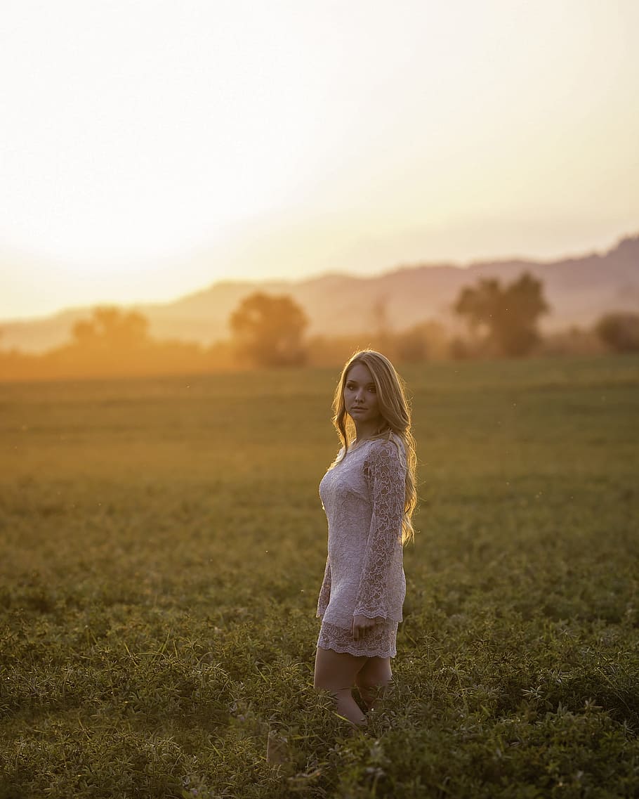 woman wearing white dress on grass field, sunset, model, girl HD wallpaper