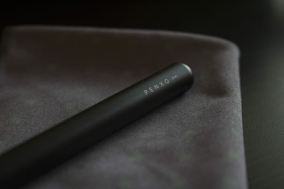 Penxo labeled case, black Penzo pen, cloth, millimeter, close-up HD wallpaper