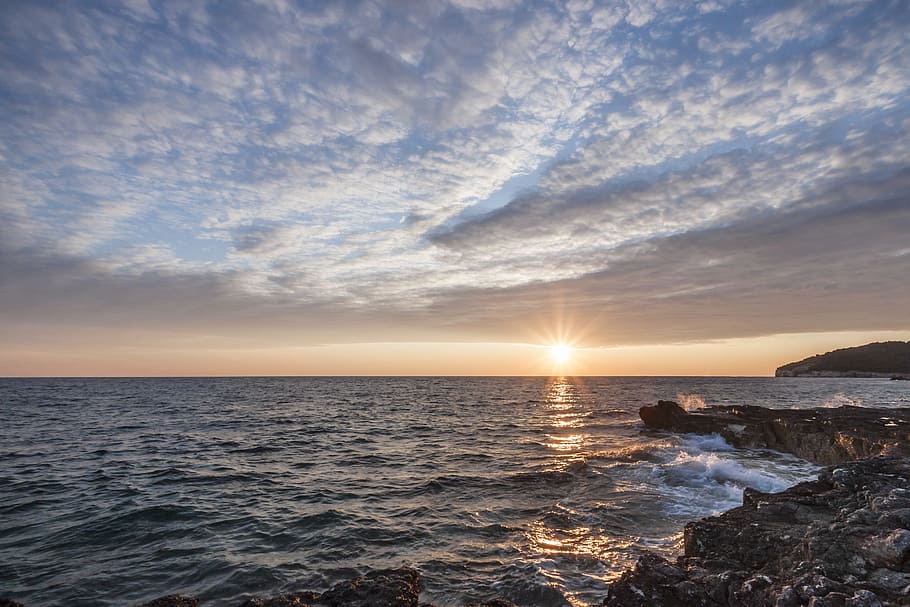 Black Rock Beside the Sea Under the Sunset, beach, clouds, coast HD wallpaper