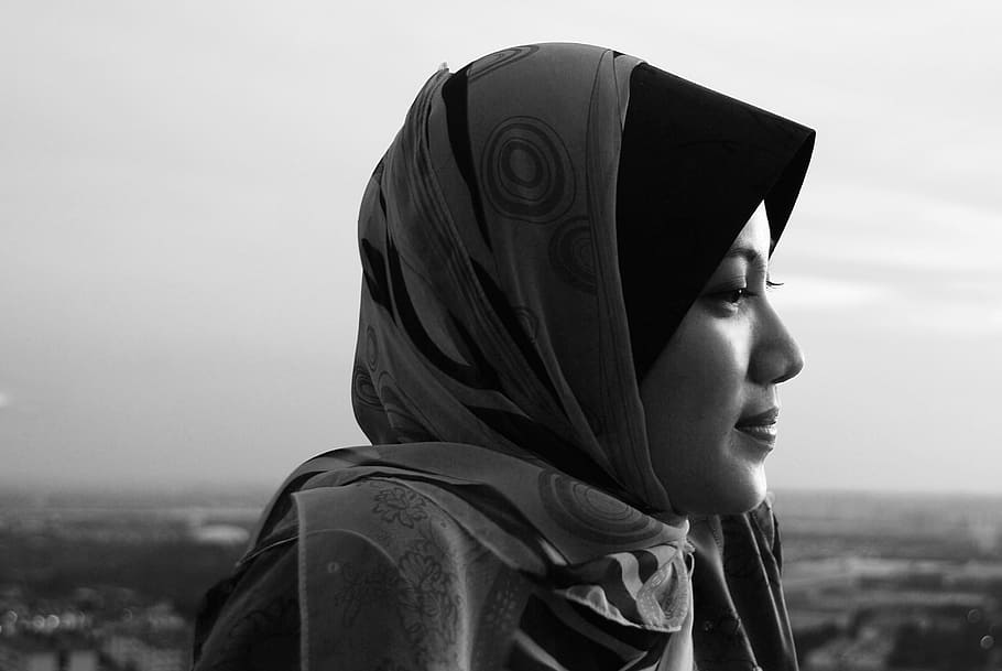 gray scale photography of woman wearing hijab scarf, sillluethe