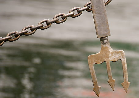 close-up photography of gray metal chain, ship, spear, neptune HD wallpaper