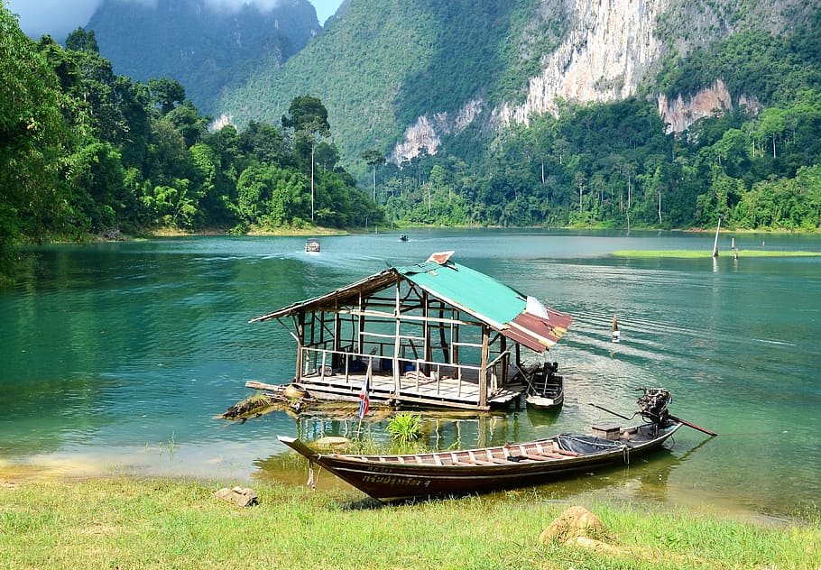 brown motorboat on riverbank, Thailand, Khao Sok, National Park