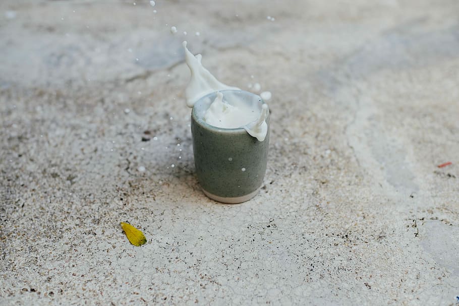 grey steel component, timelapse photography of spilled white substance on ceramic cup HD wallpaper