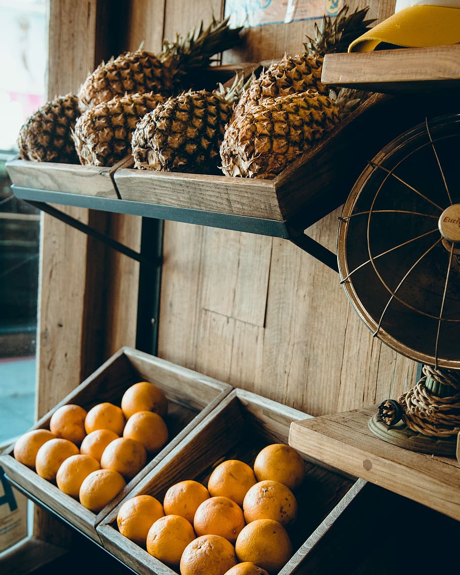 pineapple and orange fruits on brown wooden rack, pineapple and orange citrus HD wallpaper