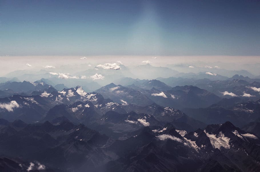 aerial view of black and white mountain, bird's eye view of a mountain during daytime HD wallpaper