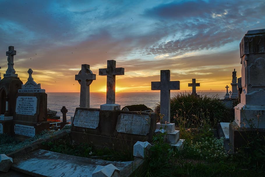 cemetery by the sea under blue and orange sky during sunset, sunrise, HD wallpaper