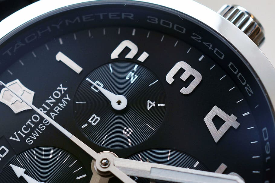 round black Victorinox chronograph watch, clock, time, masculine