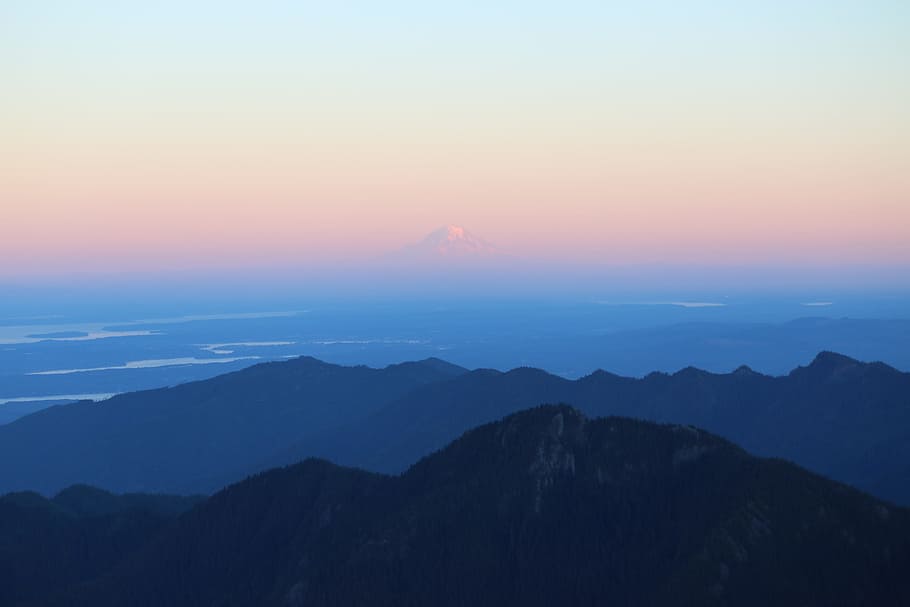 landscape photography of silhouette of mountains during daytime, mountain top under sunny sky HD wallpaper