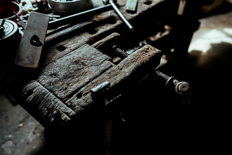 Tools, nails and bolts in a workshop, wooden, metal, nuts, diy