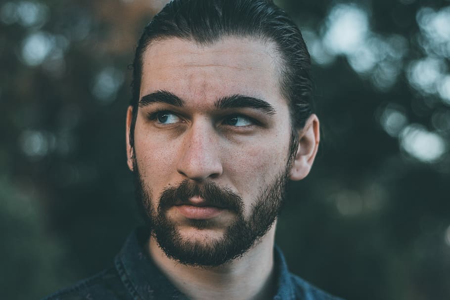 shallow focus of man, selective focus photography of man with beard HD wallpaper