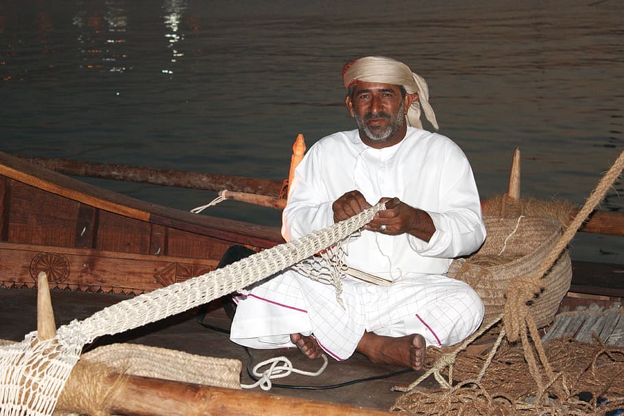 dhow, doha, nets, fisherman, one person, sitting, front view