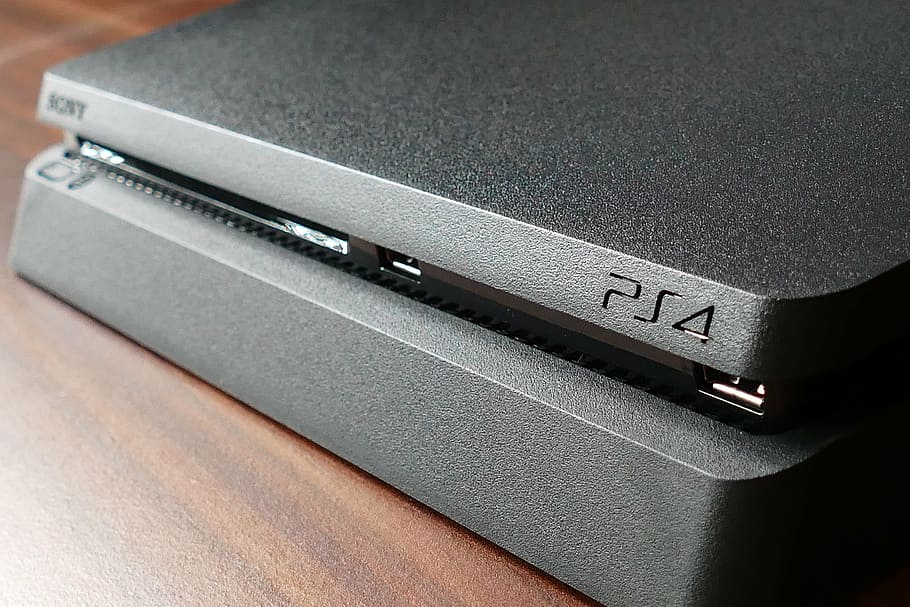 black Sony PS4 slim on brown surface, playstation, playstation 4, HD wallpaper