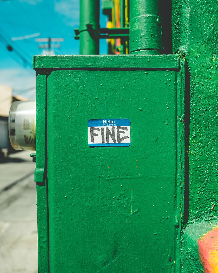 green steel box with fine-printed sticker, green metal frame HD wallpaper