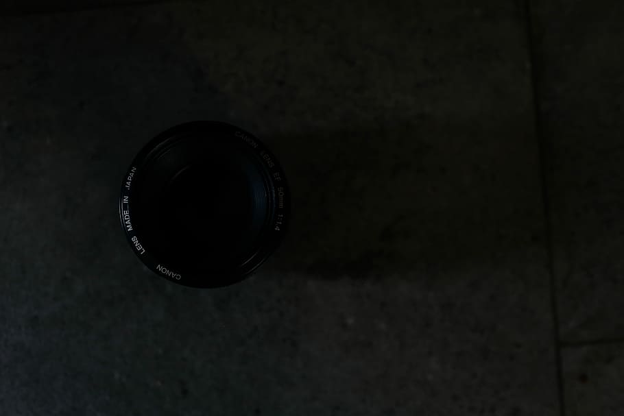 closeup photography of camera lens on floor tile, round black camera lens HD wallpaper