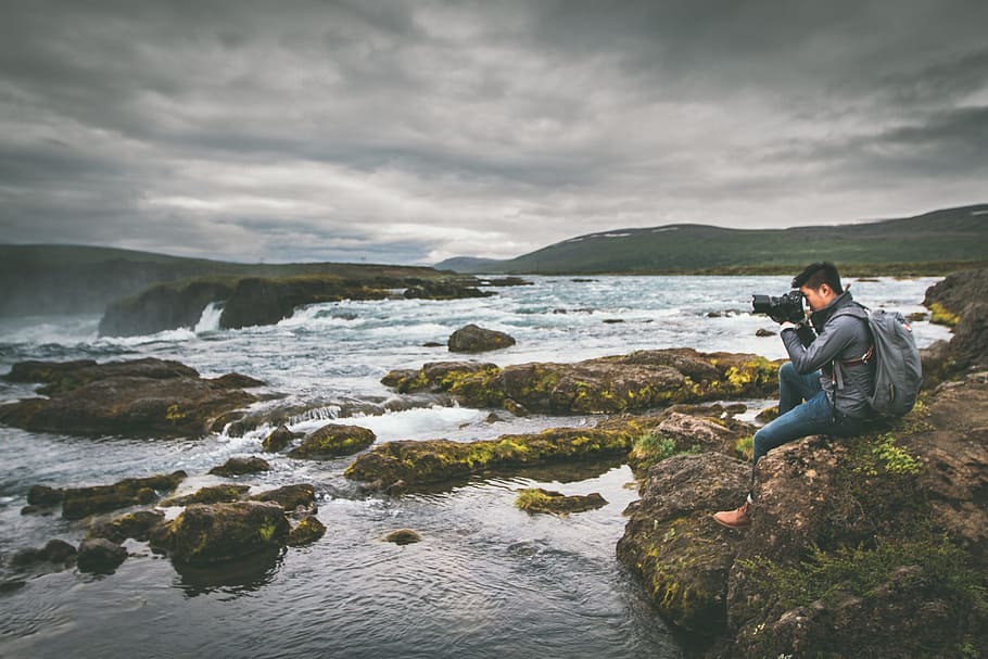 river, water, rocks, green, moss, people, man, photographer HD wallpaper
