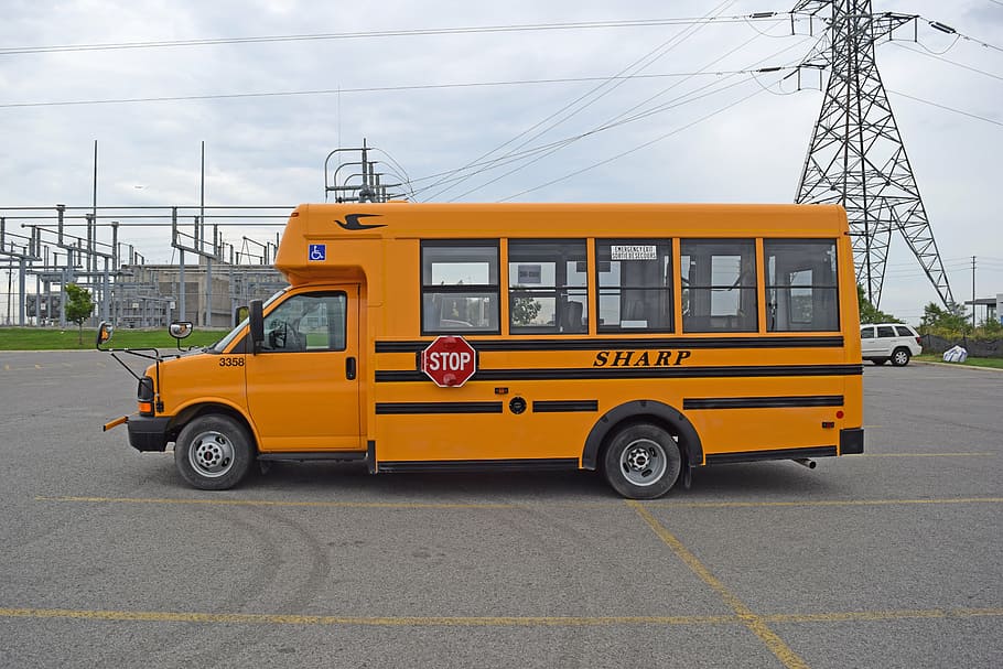 school bus beside transmission tower, orange, transport, education, HD wallpaper