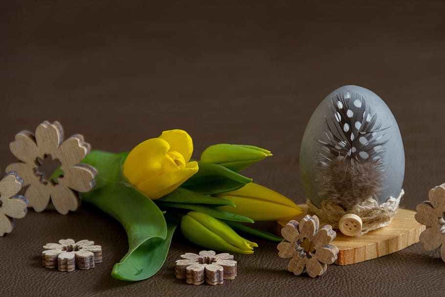 yellow flower on top of brown surface near brown wooden flower cutout decors HD wallpaper