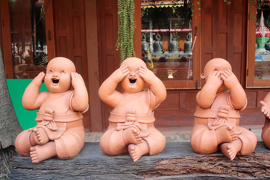 three wise baby statue on brown wooden plank, Buddha, Figures