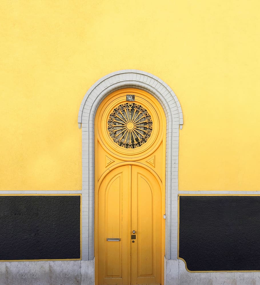 yellow wooden door between yellow wall, yellow wooden closed door, HD wallpaper