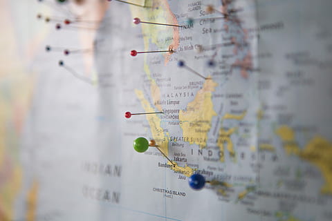 world map with pins, assorted-colored pin on country map, planning HD wallpaper