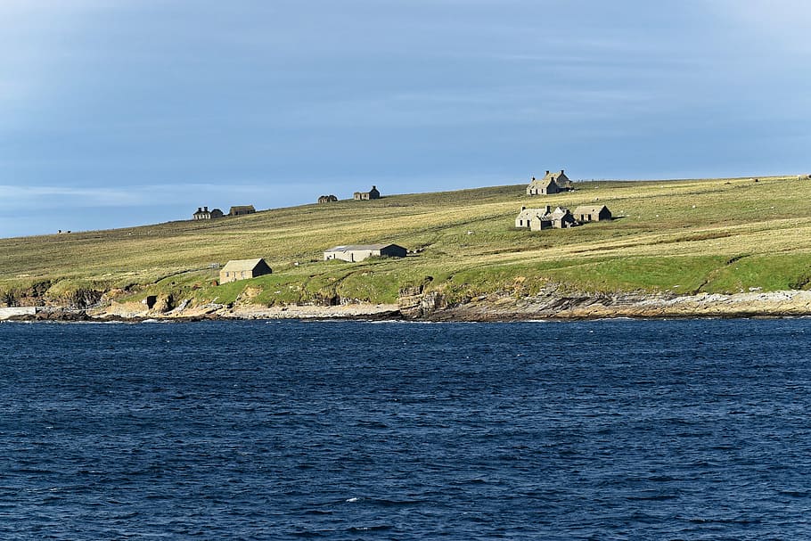 brown house near sea at daytime, seascape, landscape, shoreline