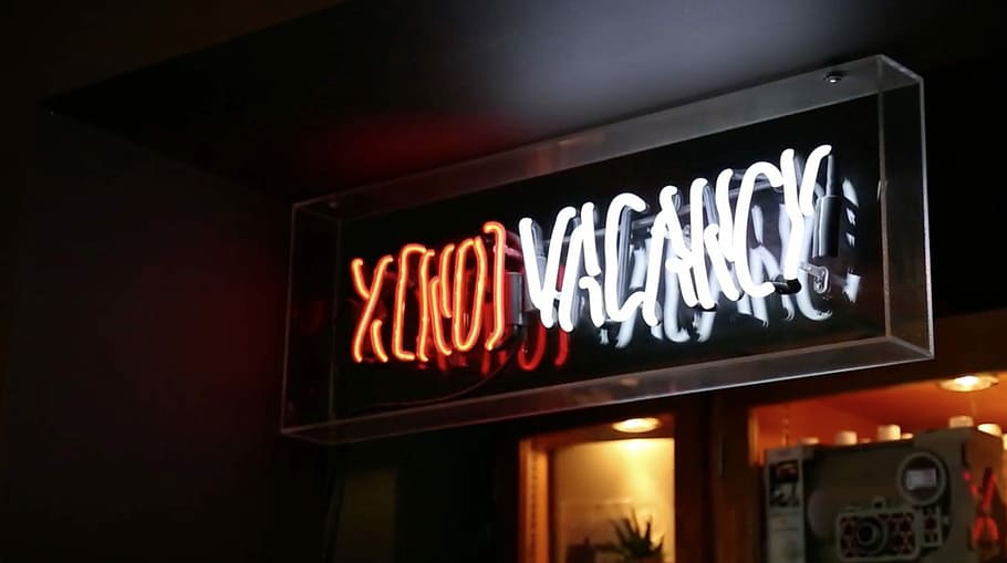 photo of white and orange LED signage, turned of red and white LED signage HD wallpaper