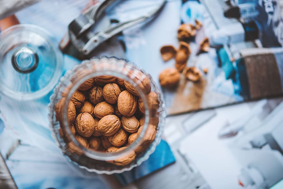 closeup photo of almonds in clear mason jar, walnuts, autumn HD wallpaper
