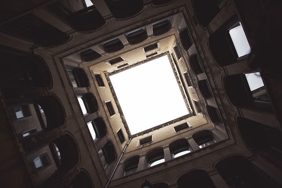 low-angle of photo of square shape building, low angle photography of gray concrete building HD wallpaper