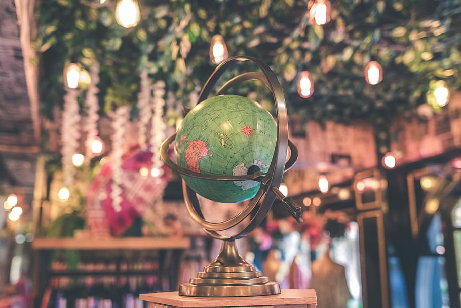 Vintage globe close up in the antique store, shallow focus photography of desk globe HD wallpaper