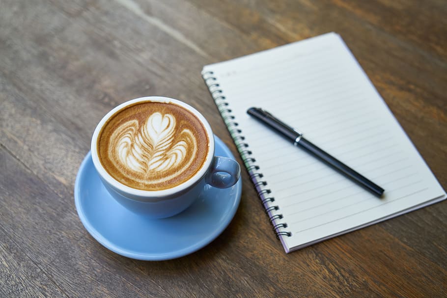 Cappuccino artwork near on notebook and pen, coffee, caffeine, HD wallpaper
