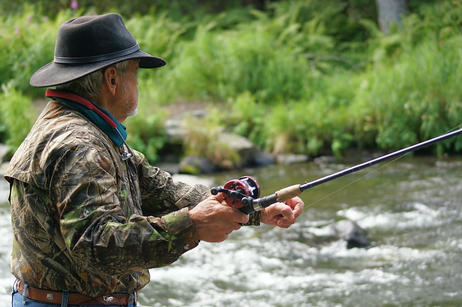 man fishing during day time, fisherman, river, stream, alaska