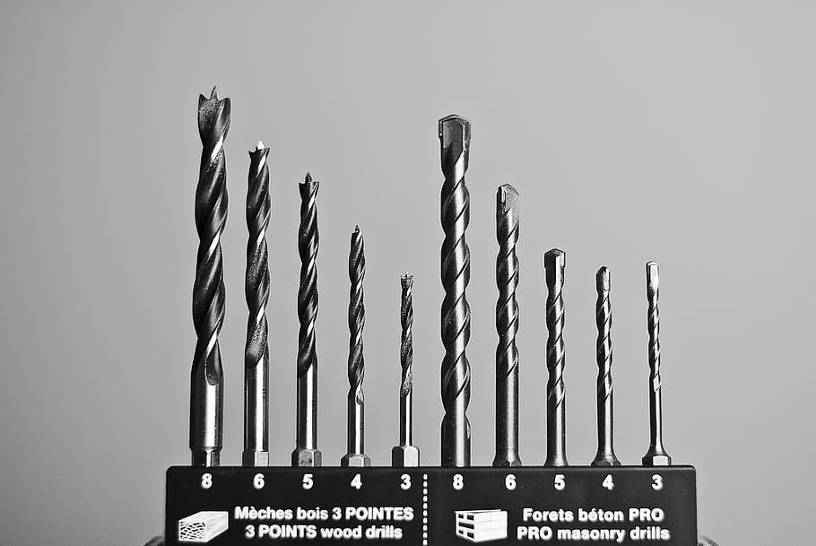 closeup photo of drill bits, tool, construction, industry, steel